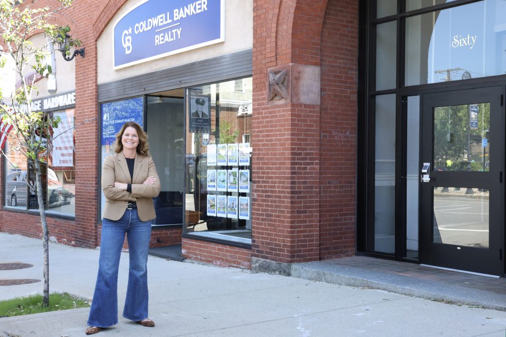 Becky Davis, Coldwell Banker Realtor, standing outside her Milton MA office, helping buyers navigate home buying decisions.